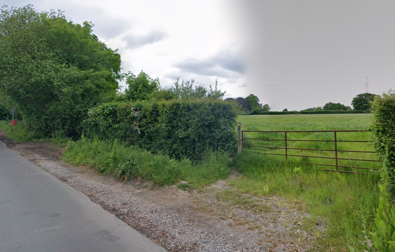 The field gateway across from the house where parking is available